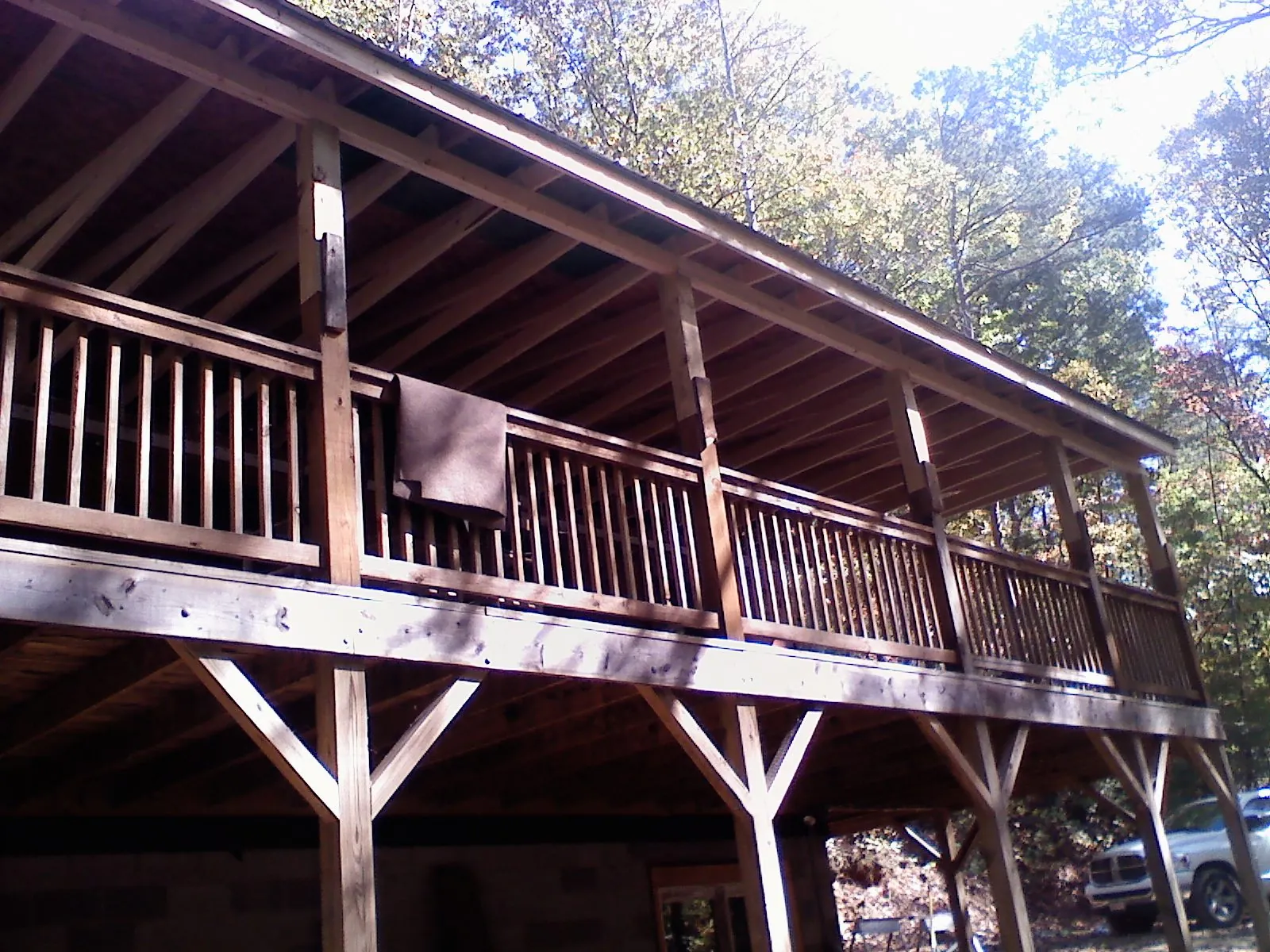 Timber framing under a new elevated porch and deck — Roof Leak Repair in Belews Creek by Roofing Brothers